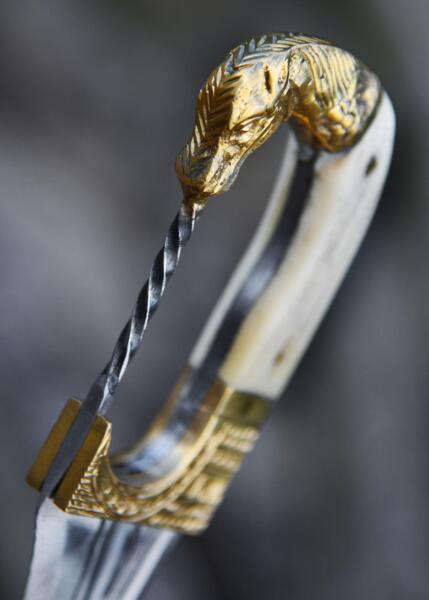 Falcata med Hestehovedgreb