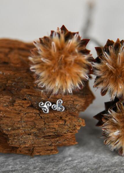 Ørestikker med Triskelion