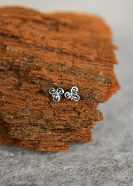 Ørestikker med Triskelion