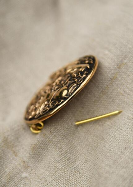 Keltisk fibula med tre heste